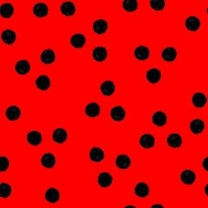 red with black polka dots