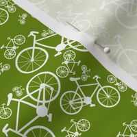 White Bicycles Green Background