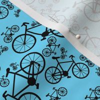 Black Bicycles Blue Background