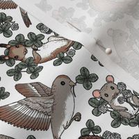 Woodland animals search for lucky clovers - tiny scale