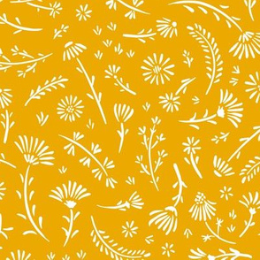 Small flowers and twigs on yellow background
