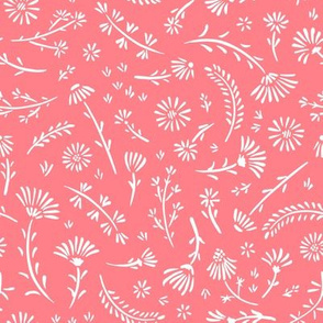 Small flowers and twigs on pink background