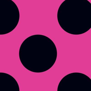 Large black polka dots on fuschia