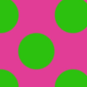 Large green polka dots on fuschia
