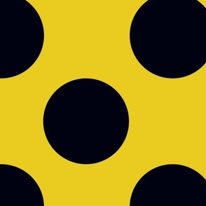 Large black polka dots on yellow