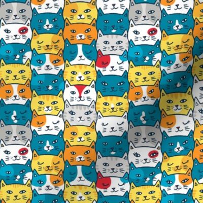 cat heads in bright blue/yellow (small)