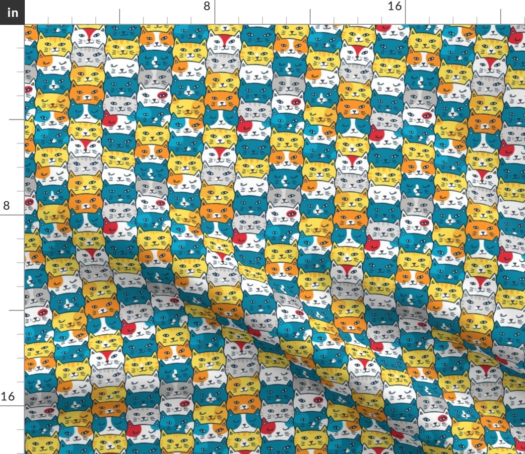 cat heads in bright blue/yellow (small)