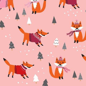 little fox in winter on pink