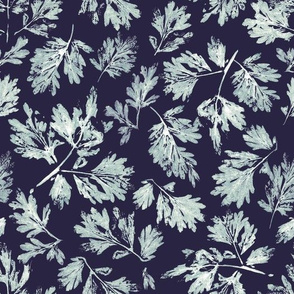 Seamless pattern of hand prints of leaves.