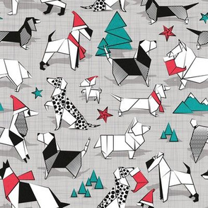 Small scale // Origami Christmas doggie friends // grey linen texture background black and white dog breeds with red and turquoise green Santa hats stars Holiday socks trees and mountains