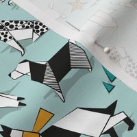 Small scale // Origami Christmas doggie friends // aqua background black and white dog breeds with saffron yellow and turquoise green Santa hats stars Holiday socks trees and mountains