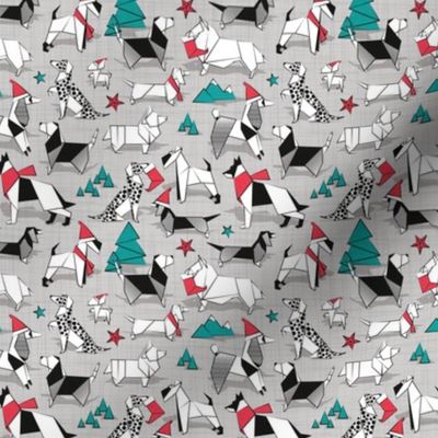 Tiny scale // Origami Christmas doggie friends // grey linen texture background black and white dog breeds with red and turquoise green Santa hats stars Holiday socks trees and mountains