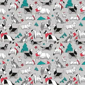 Tiny scale // Origami Christmas doggie friends // grey linen texture background black and white dog breeds with red and turquoise green Santa hats stars Holiday socks trees and mountains