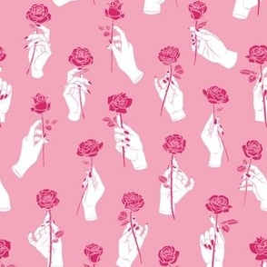 Hands Holding Roses in Pink