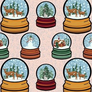 Winter wonderland snow globes on a pink background 