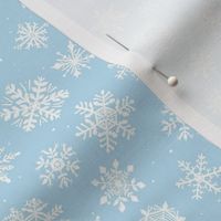 Small Light blue winter snowflakes snow 