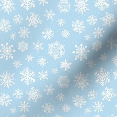 Small Light blue winter snowflakes snow 