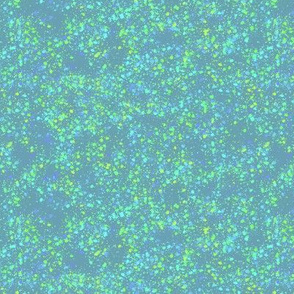 Colorful Paint Splatter Pattern with Blue and Green Colors with a Blue Background