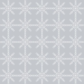 thin geometrical white snowflakes on light grey - nude Christmas collection