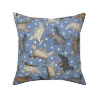 Trotting Afghan Hounds and paw prints - faux denim