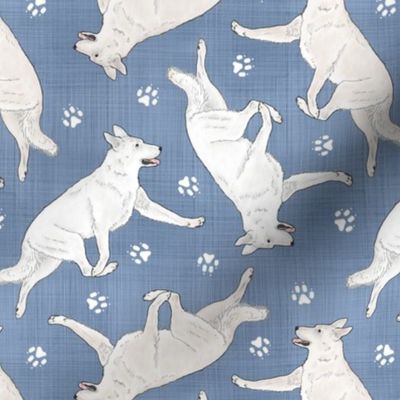 Trotting White Shepherd dogs and paw prints - faux denim
