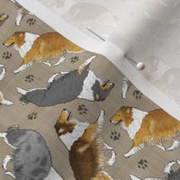 Tiny Trotting rough coated Collies and paw prints - faux linen
