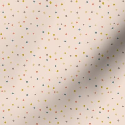 Earth tone small dots on warm beige background 