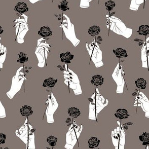 Hands Holding Roses in Grey