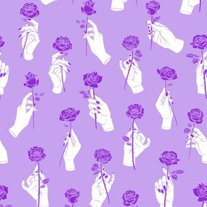 Hands Holding Roses in Purple