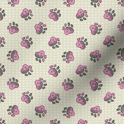 Hand drawn cute pink puppy dog paw with claw seamless pattern. 