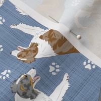 Trotting multicolor Border Collies and paw prints - faux denim