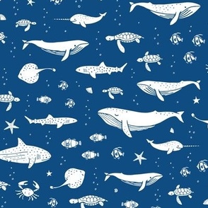 Marine animals and fish on a blue background