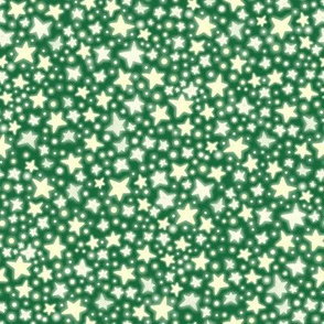 Glowing Christmas Tree Stars - sparkly yellow on firn tree green