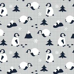 Penguins. Gray background. Small scale