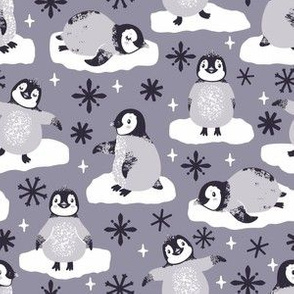 Cute penguins. Gray background