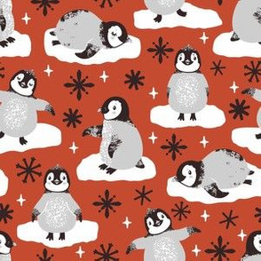 Cute penguins. Red background