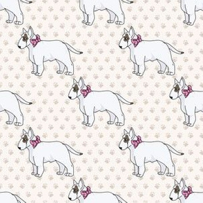  Hand drawn cute bull terrier dog with pink bow seamless pattern. 