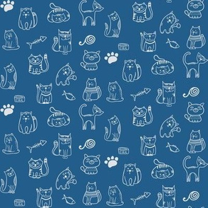 Small Cat Characters on Blue