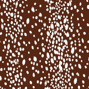 Dots in white on brown