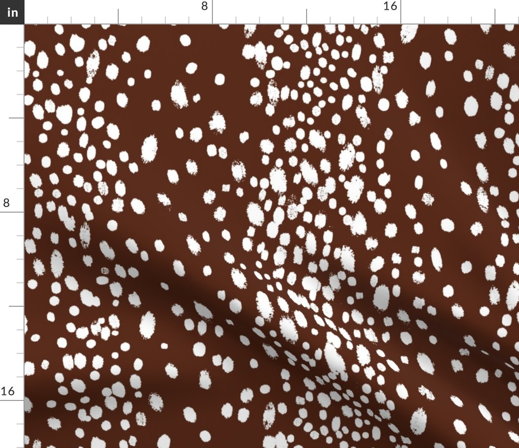 Dots in white on brown