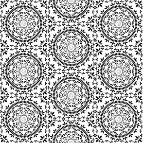 Floral mandala in black and white colors