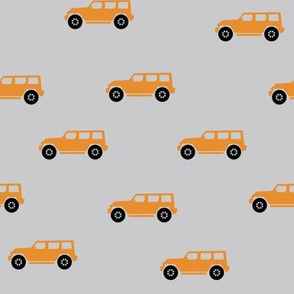 Punkin Orange Jeep Wrangler Grey Background