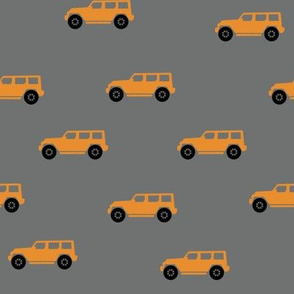 Orange Jeep Wrangler Dark Grey Background