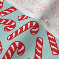 candy canes on light blue