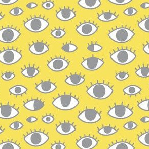 Grey yellow human eyes