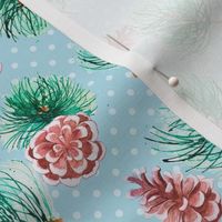 pine branches and cones on blue polkadot