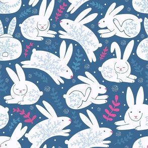 White cute rabbits on blue