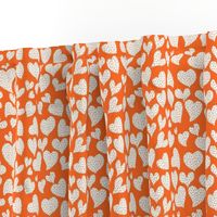 Dottie Hearts // White on Orange 