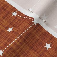 constellations in burnt orange linen