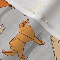 Small scale // Origami Golden Retriever and Labrador friends // grey linen texture background orange and beige paper and cardboard dogs